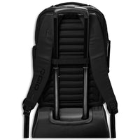 C8 Color-Matched | OGIO® Commuter XL Pack - Back View on Top of Luggage